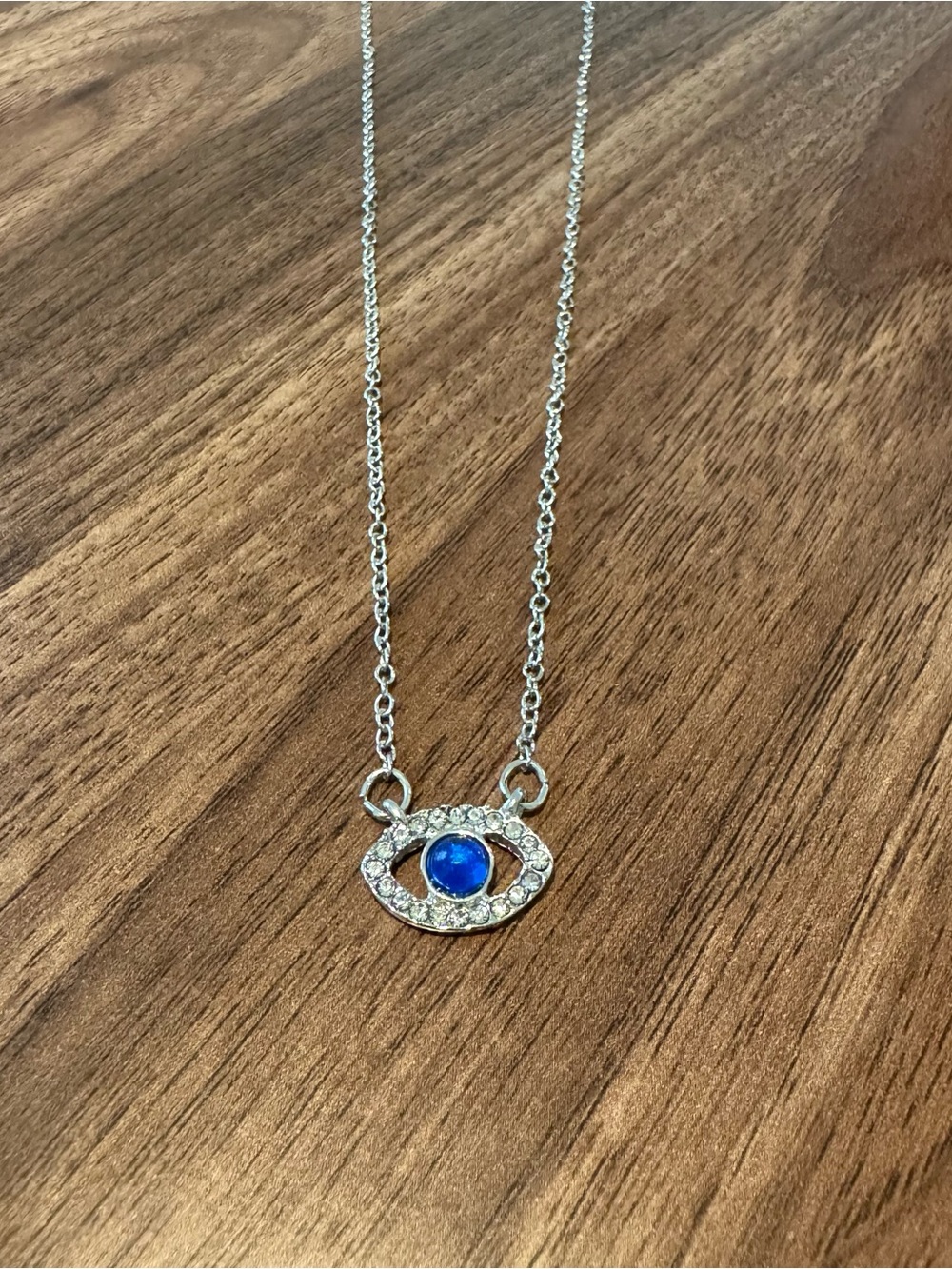 Silver-Tone Necklace with Blue Eye Pendant and Crystal Accents